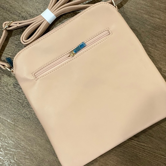 Leopard print cross body purses 9”x9”. Has a blush undertone. - Picture 4 of 7